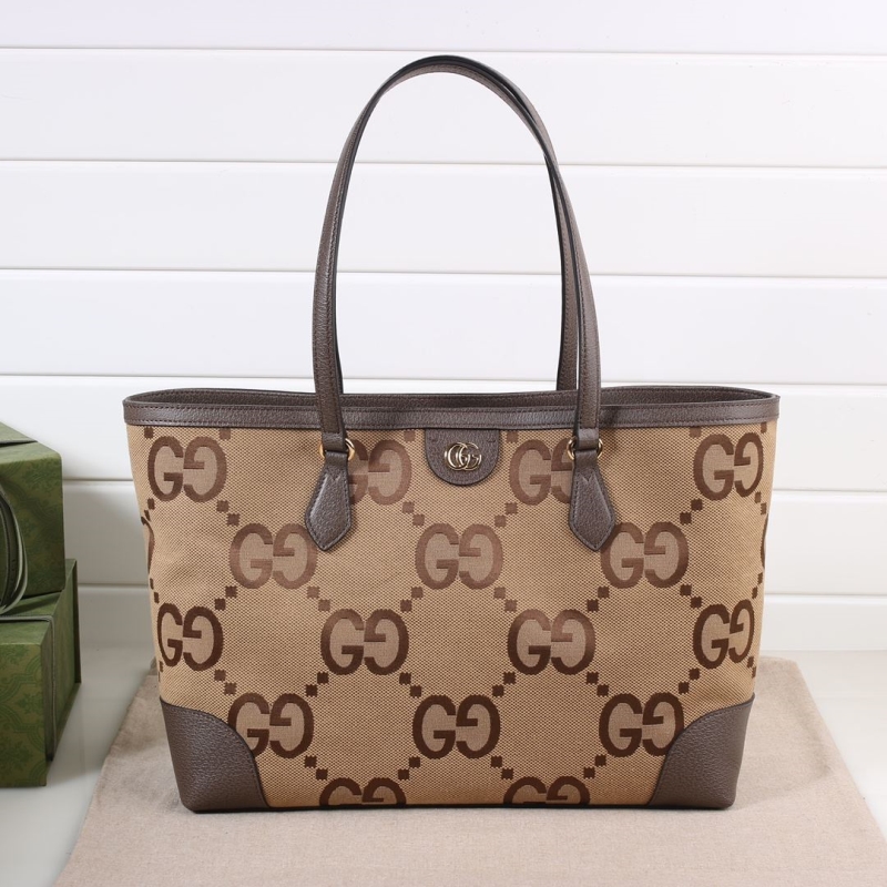 G*u*i shopping bags